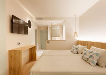 Dos llits habitació de luxe a Hotel Marítim