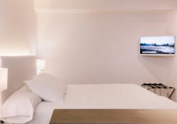 Cama habitación premium Hotel Marítim